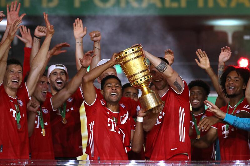 Serge Gnabry with the cup. EPA