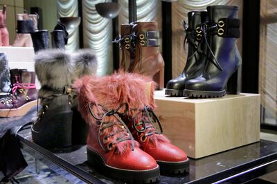 The designs of Stuart Weitzman are displayed in the The Pool, in the former Four Seasons Restaurant, during New York Fashion Week, Thursday, Feb. 8, 2018. (AP Photo/Richard Drew)