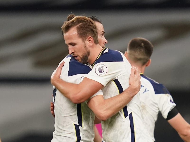 Gareth Bale celebrates after the match with Harry Kane. Reuters