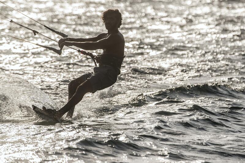 DUBAI, UNITED ARAB EMIRATES. 12 OCTOBER 2020. UAE kitesurfing champion Mohammed Al Mansoori. Mohammed got into the sport after falling in a coma from a biking accident which also broke both his legs and meant that he couldn't walk for years. As the captain of the UAE kitesurfing club, he calls
for more Emiratis to join the sport so it could grow in the region and they could have a GCC league. (Photo: Antonie Robertson/The National) Journalist: Haneed Dajani. Section: National.
