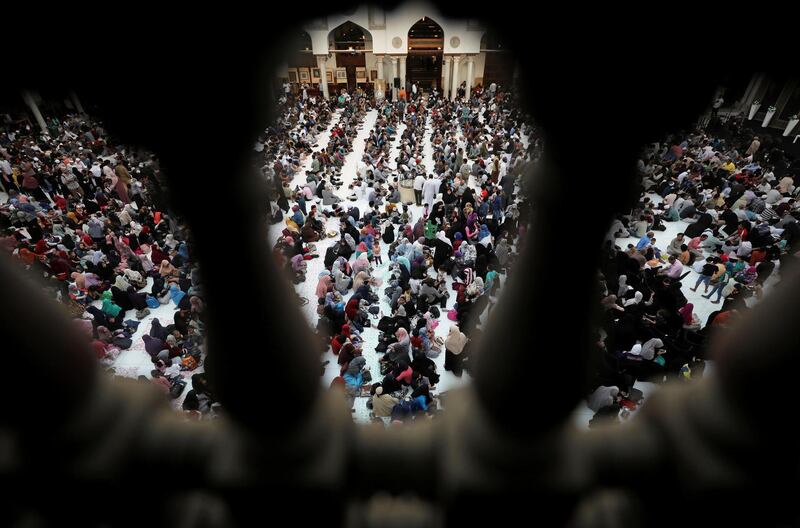 Muslims gather to eat Iftar in Cairo, Egypt. Reuters