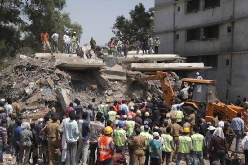 Rescue workers pulled a number of survivors from the debris after an unauthorised building collapsed in Thane district on the oustskirts of Mumbai.