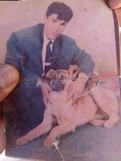 Omar Bin Omran as a teenager, pictured with his dog. Photo: Djelfa Judicial Council
