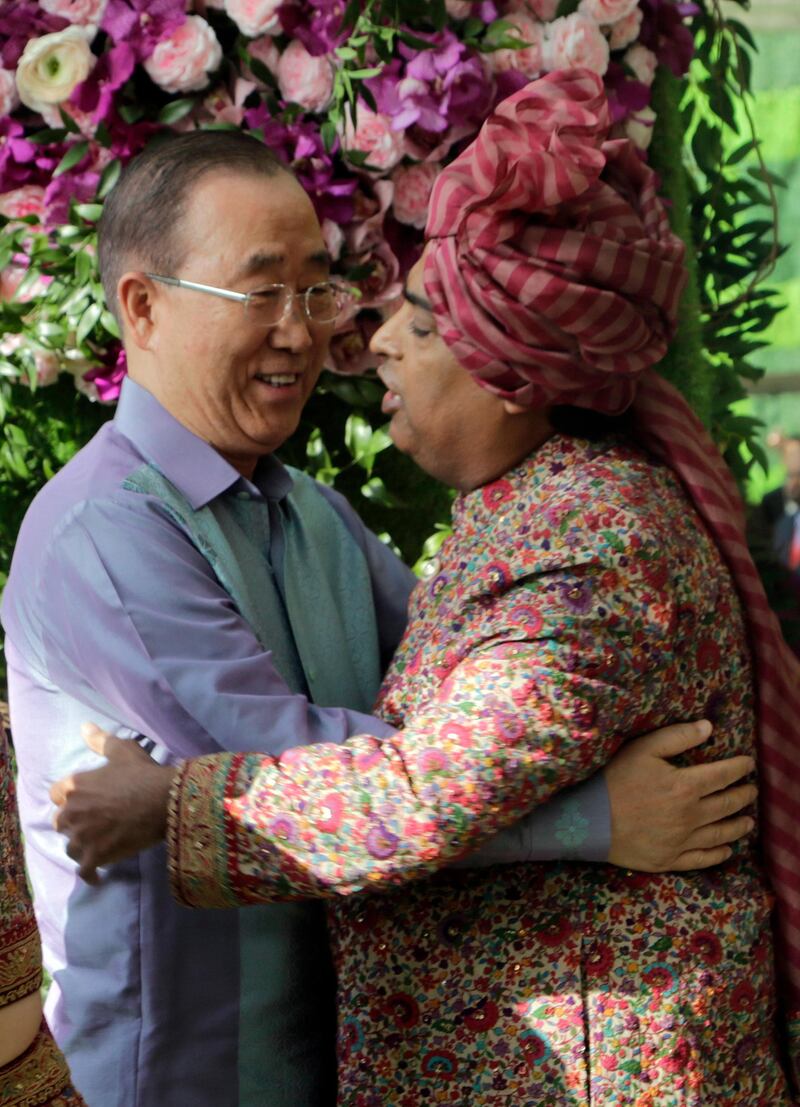 Reliance Industries Chairman Mukesh Ambani welcomes former U.N. Secretary-General Ban Ki-moon at the wedding of his son Akash Ambani. Photo: AP