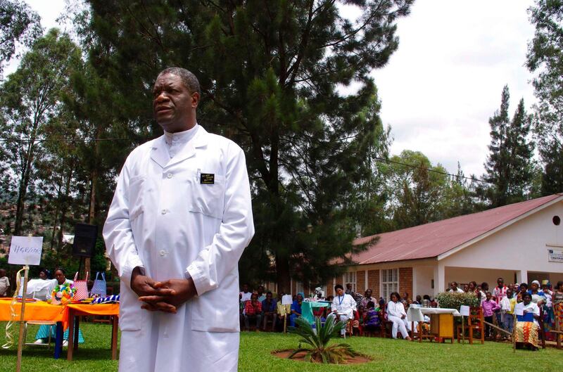 (FILES) In this file photo taken on March 18, 2015 Congolese gynaecologist Denis Mukege poses at Panzi Hospital, in the outskirts of Bukavu. Dr Mukwege and his staff  gained international recognition for their fight in treating and helping heal women raped in South and North Kivu.  Congolese doctor Denis Mukwege and Yazidi rape victim Nadia Murad won the 2018 Nobel Peace Prize on October 5, 2018 for their work in fighting sexual violence in conflicts around the world.  / AFP / Marc JOURDIER
