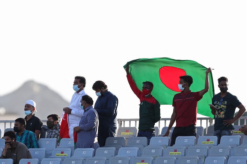 The Bangladesh national flag is waved. AFP
