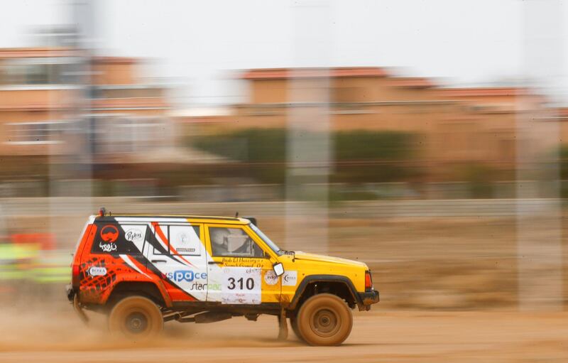 Doroub Rally team pair Ehab El Hussiny and Sameh Gamal, of Doroub Rally team, accelerate away at the O West Rally 2021. Reuters
