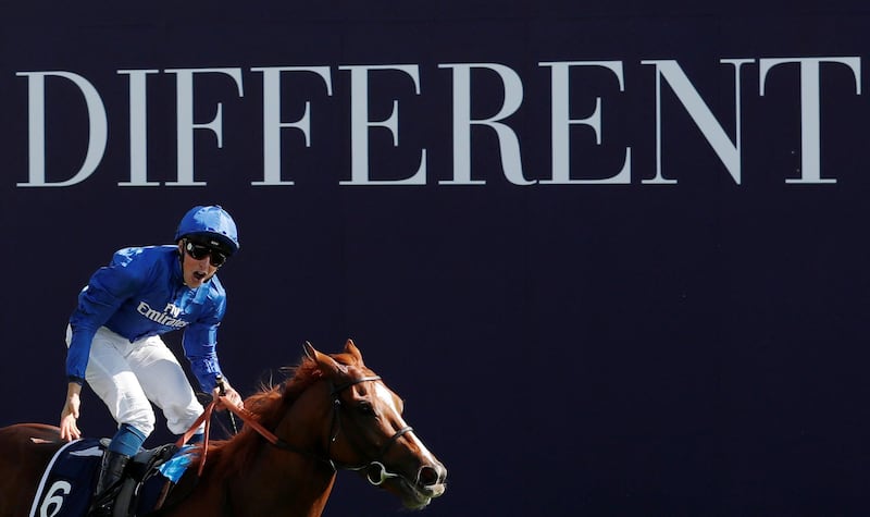 Horse Racing - Derby Festival - Epsom Downs Racecourse, Epsom, Britain - June 2, 2018   William Buick celebrates on Masar as he wins the 4.30 Investec Derby   Action Images via Reuters/Andrew Boyers