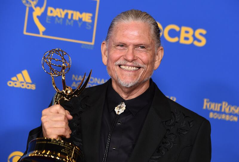 Jeff Kober poses in the press room with the award for outstanding performance by a supporting actor in a drama series for his role in 'General Hospital'. AP 
