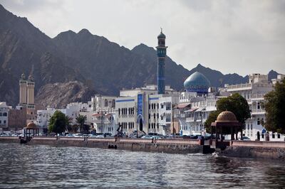 The white buildings of the Mutrah district line the corniche at Mina Sultan Qaboos in downtown Muscat, the capital of the Sultanate of Oman on Wednesday, Oct. 12, 2011. (Silvia Razgova / The National)

