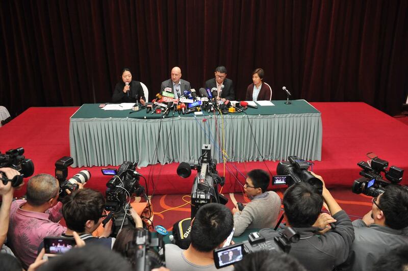Hugh Dunleavy, second left, and Ignatius Ong, second right from Malaysia Airlines speak during a press conference in Beijing, China. ChinaFotoPress / ChinaFotoPress via Getty Images