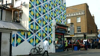 Artist Zarah Hussain’s work, in collaboration with Wood Street Walls, is to paint buildings with designs inspired by Islamic geometry. Courtesy Amal - Saïd Foundation