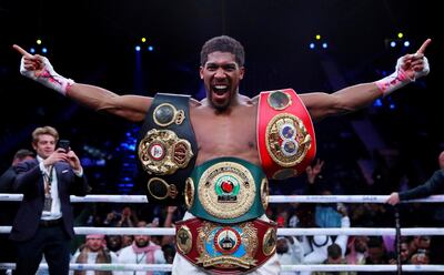 FILE PHOTO: Boxing - Andy Ruiz Jr v Anthony Joshua - IBF, WBA, WBO & IBO World Heavyweight Titles - Diriyah Arena, Diriyah, Saudi Arabia - December 7, 2019 Anthony Joshua celebrates winning his fight against Andy Ruiz Jr.  Action Images via Reuters/Andrew Couldridge/File Photo