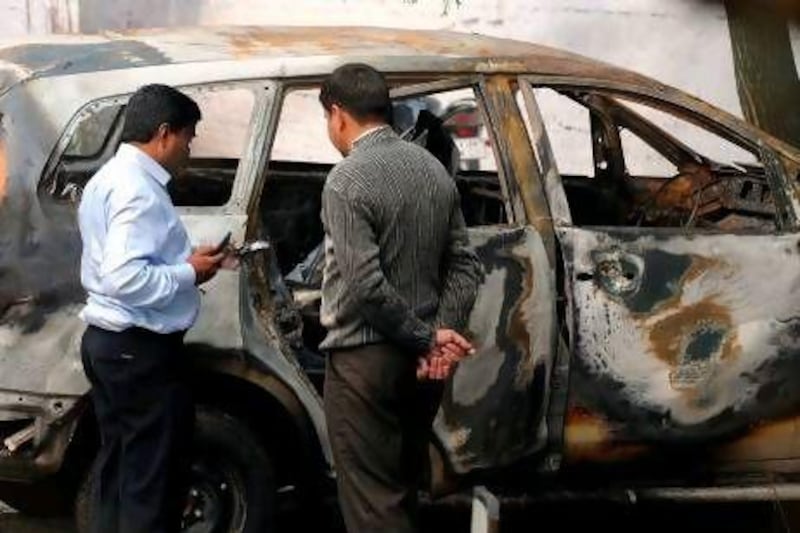 A magnetic bomb that was planted on a car by a motorcyclist in Delhi on Monday injured the wife of an Israeli diplomat. Iran was blamed for the attack.