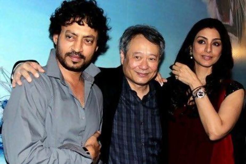 Irrfan Khan, left, says Life of Pi by Ang Lee, centre, is "the best among all 3D films you have seen". AFP