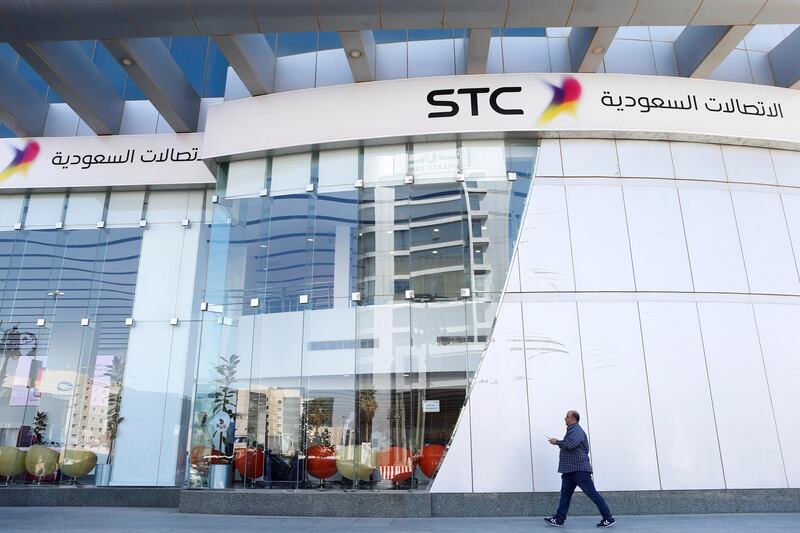 A man passes the Saudi Telecom STC office in Riyadh, Saudi Arabia February 6, 2018. REUTERS/Faisal Al Nasser