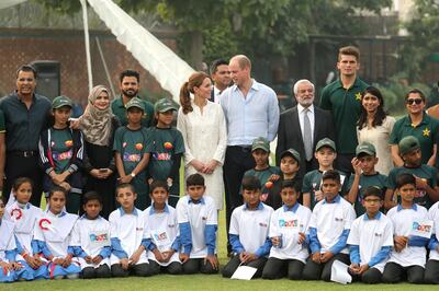 LAHORE, PAKISTAN - OCTOBER 17: Prince William, Duke of Cambridge and Catherine, Duchess of Cambridge pose with players during their visit at the National Cricket Academy during day four of their royal tour of Pakistan on October 17, 2019 in Lahore, Pakistan. The British Council runs the DOSTI program to promote sport as an integral part of child development.  (Photo by Chris Jackson/Getty Images)