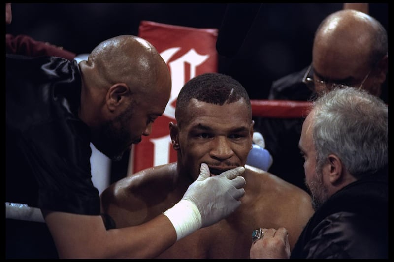 16 Mar 1996:  Mike Tyson sits in his corner during a bout against Frank Bruno in Las Vegas, Nevada. Mandatory Credit: Al Bello  /Allsport / Getty Images