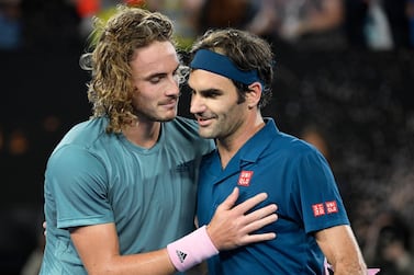 Only a month after Stefanos Tsitsipas, left, beat Roger Federer at the Australian Open, they could meet again in Dubai. Andy Brownbill / AP Photo