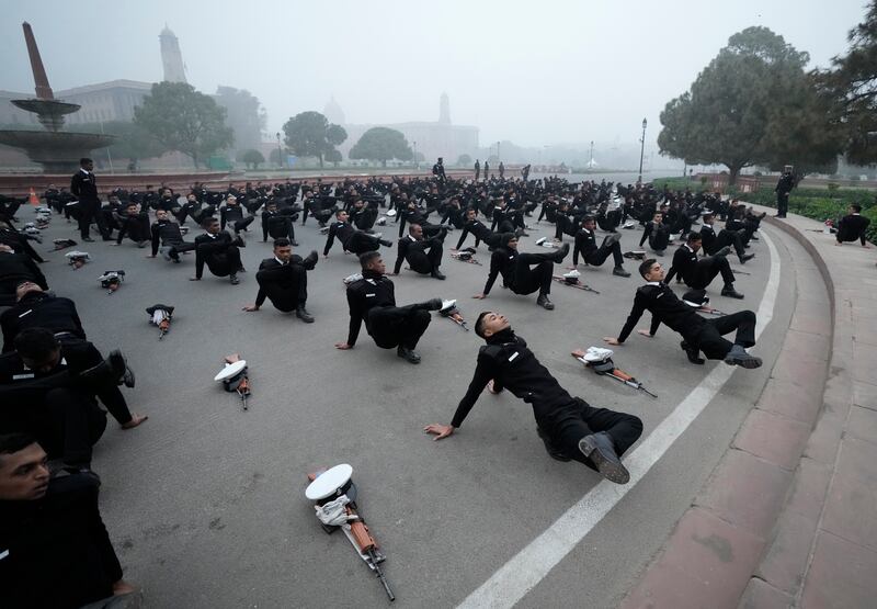 Indian Navy soldiers rehearse for the republic day parade, in New Delhi. AP