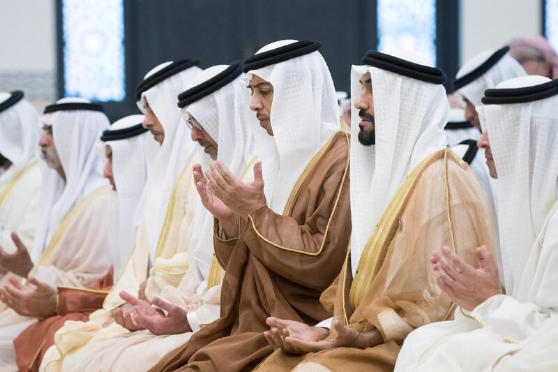 ABU DHABI, UNITED ARAB EMIRATES - June 04, 2019: HH Sheikh Hazza bin Zayed Al Nahyan, Vice Chairman of the Abu Dhabi Executive Council (R), HH Sheikh Nahyan Bin Zayed Al Nahyan, Chairman of the Board of Trustees of Zayed bin Sultan Al Nahyan Charitable and Humanitarian Foundation (2nd R), HH Sheikh Mansour bin Zayed Al Nahyan, UAE Deputy Prime Minister and Minister of Presidential Affairs (3rd R) and HH Sheikh Hamed bin Zayed Al Nahyan, Chairman of the Crown Prince Court of Abu Dhabi and Abu Dhabi Executive Council Member, attend Eid Al Fitr prayers at the Sheikh Sultan bin Zayed the First mosque in Al Bateen. 

( Rashed Al Mansoori / Ministry of Presidential Affairs )
---