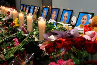 Friends and faculty members gather at The University of Windsor, Ontario for a memorial service for the five University of Windsor students who died in the Ukraine International Airlines flight crash in Iran, on January 10. Rob Gurdebeke / The Canadian Press via AP