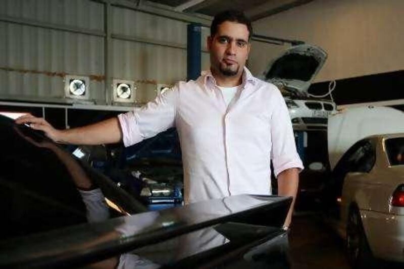 DUBAI, UNITED ARAB EMIRATES Ð Sep 15: Ayham Al Daqqa, President of the BMW club for the Middle East and the owner of Das AutoWorks at his workshop near Times Square Mall in Dubai. (Pawan Singh / The National) For Personal Finance.


