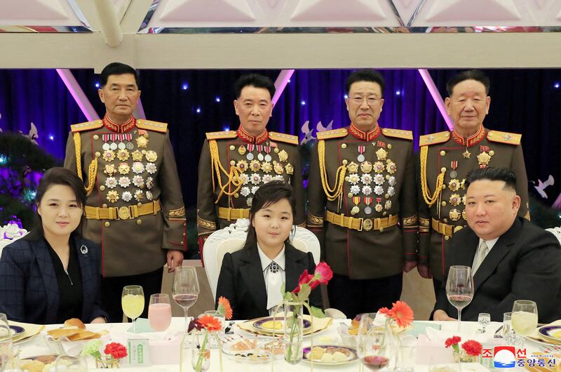 North Korean leader Kim Jong Un, his wife Ri Sol Ju and their daughter Kim Ju Ae attend a banquet to celebrate the 75th anniversary of the Korean People's Army, in Pyongyang. Reuters