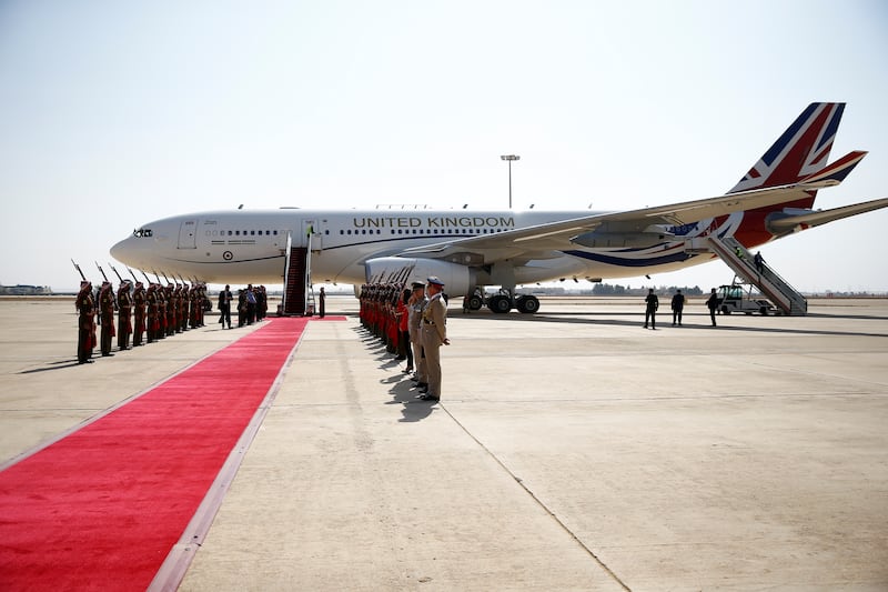 The plane carrying Prince Charles and Camilla arrives at the international airport in Amman on Tuesday. Reuters