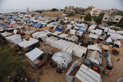 Tents were set up for displaced Palestinians in Al Mawasi area in Deir Al Balah in April. Reuters