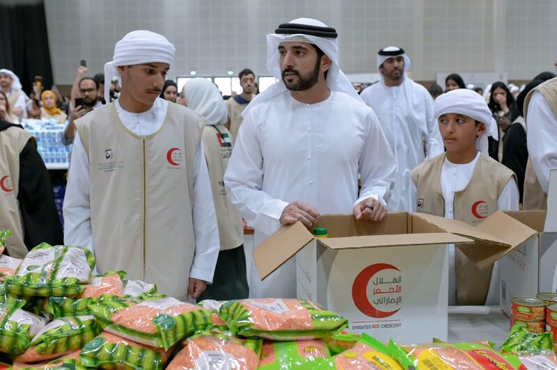 Sheikh Hamdan bin Mohammed, Crown Prince of Dubai, at the Bridges of Giving collection. Photo: Dubai Media Office