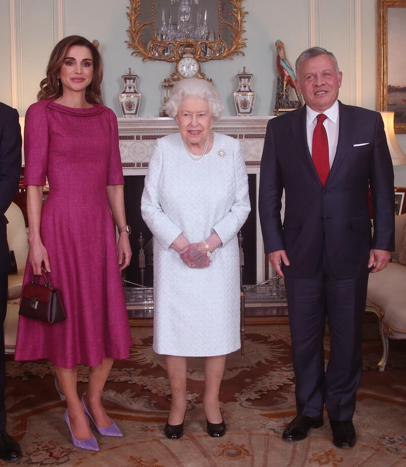 LONDON, ENGLAND - JANUARY 01: (L-R) Queen Rania of Jordan, Queen Elizabeth II and King Abdullah II of Jordan during a private audience at Buckingham Palace on January 1, 2019 in London, England. (Photo by Yui Mok - WPA Pool/Getty Images)