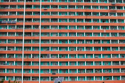 FILE PHOTO: Solar panels are seen installed on a residential building in central Pyongyang, North Korea May 6, 2016.  REUTERS/Damir Sagolj/File Photo