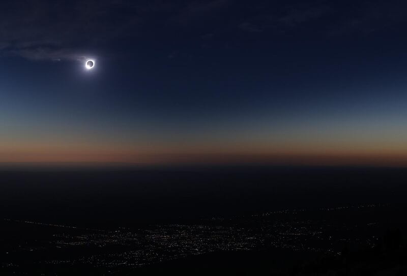 The moon covers much of the sun during the total solar eclipse, in Merlo, San Luis, Argentina.  EPA