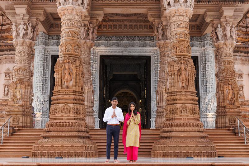 British Prime Minister Rishi Sunak and his wife Akshata Murty visit the Akshardham Hindu Temple in New Delhi. Getty Images