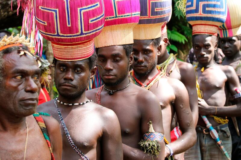 FILE - In this Nov. 29, 2019, file photo, the Upe members wait to vote in the Bougainville referendum in Teau, Bougainville, Papua New Guinea. The South Pacific region of Bougainville has voted for independence from Papua New Guinea.Â The referendum is nonbinding, and independence would need to be negotiated between leaders from Bougainville and Papua New Guinea. (Jeremy Miller, Bougainville Referendum Commission via AP, File)