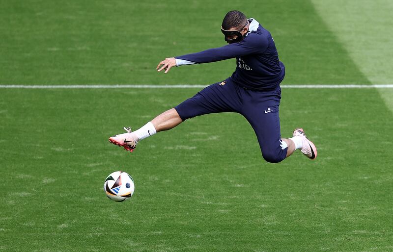France forward Kylian Mbappe scores during a training session at the Home Deluxe Arena Stadium. AFP