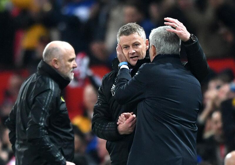 Jose Mourinho and Ole Gunnar Solskjaer embrace after the game. Getty Images