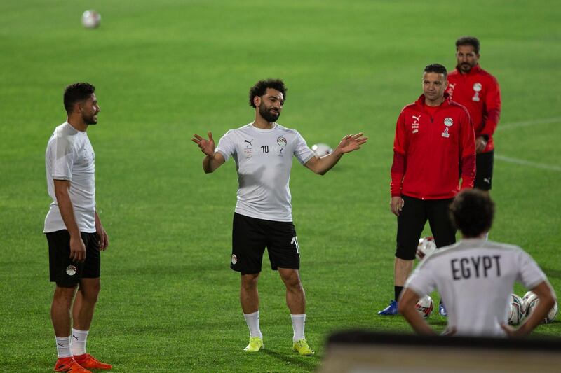 Mohamed Salah speaks to teammates and staff during a training session for the Egypt national team in Cairo ahead of the Africa Cup of Nations qualification match against Kenya.
