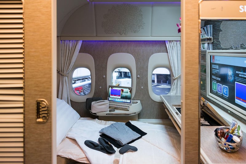 The first-class cabin on Emirates's Boeing 777 has individual suites and large flat-screen TVs. Photo: Emirates