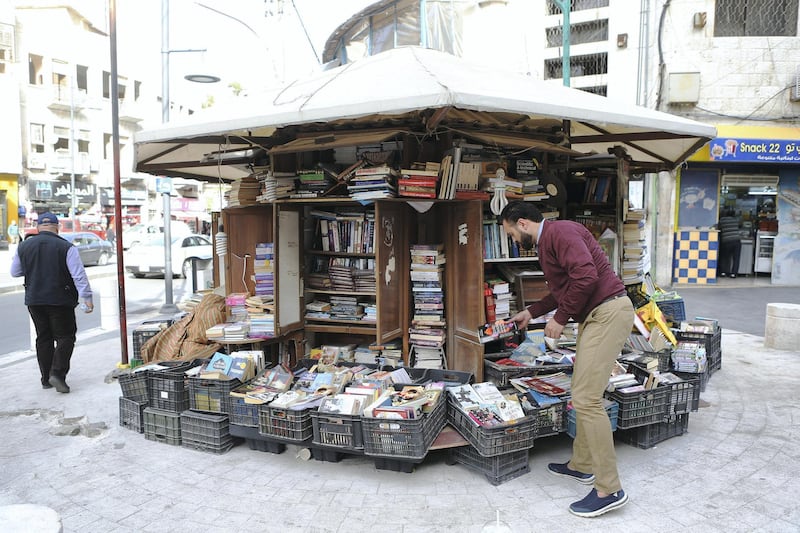 Al Jahiz library's Kiosk, is opened again by the brothers of it's owner Hisham Al Maayteh, a Jordanian bookseller who died a month after his bookstore was burnt out, in Amman, Jordan. (Salah Malkawi for The National)