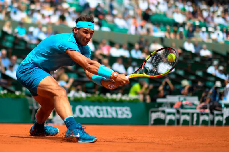 Spain's Rafael Nadal returns the ball to Argentina's Diego Schwartzman during their men's singles quarter-final match at the French Open. Christophe Simon / AFP