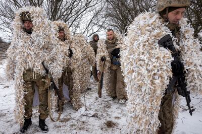 Ukrainian servicemen near the front line in the Donetsk region. Reuters