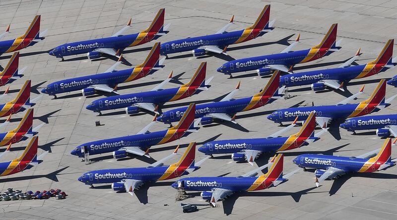 (FILES) In this file photo taken on March 28, 2019, Southwest Airlines Boeing 737 MAX aircraft are parked on the tarmac after being grounded, at the Southern California Logistics Airport in Victorville, California. The US's aviation regulator has still not received Boeing's proposed fix for its 737 MAX aircraft, which have been grounded globally following two deadly crashes, the agency's chief said on May 22, 2019. / AFP / Mark RALSTON
