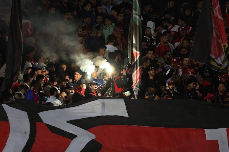 Al Ahly supporters cheer for the team at the Ibn Batouta Stadium in Tangier. AFP