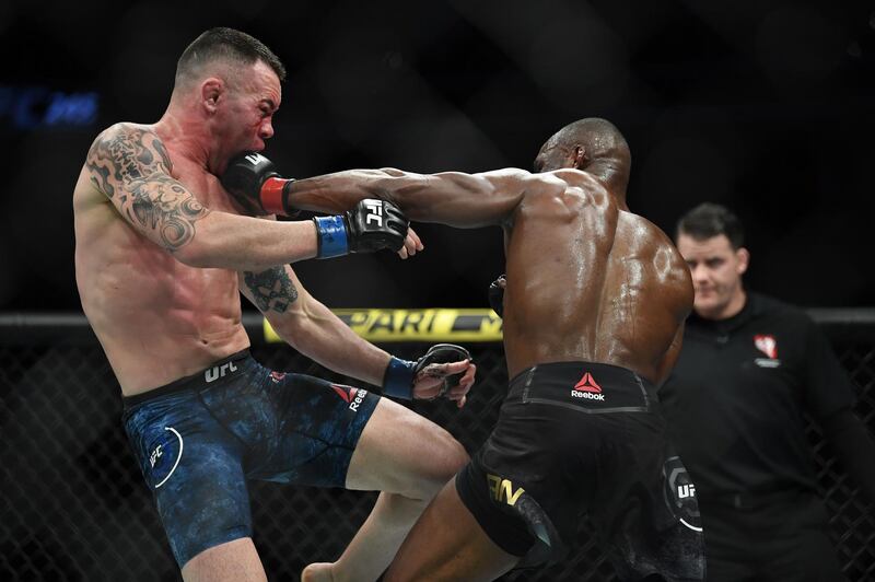 Kamaru Usman (right) during his explosive  fight with Colby Covington. USA Today