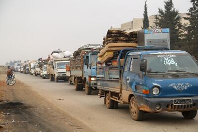 Trucks carry belongings of people fleeing from Maarat al-Numan, in northern Idlib, Syria December 24, 2019. REUTERS/Mahmoud Hassano
