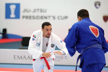 Faisal Al Ketbi of Bani Yas (white) in the men's final of the PresidentÕs Cup Jiu-Jitsu. Chris Whiteoak / The National