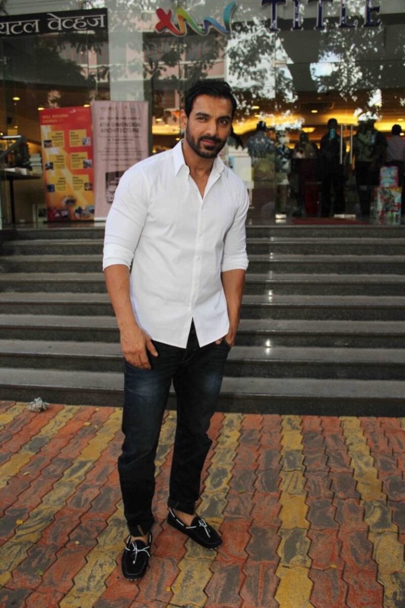 Actor and producer John Abraham looks sharp in a classic white shirt and jeans. Courtesy Instagram