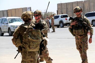 U.S. soldiers are seen during a handover ceremony of Taji military base from US-led coalition troops to Iraqi security forces, in the base north of Baghdad, Iraq August 23, 2020. Reuters 